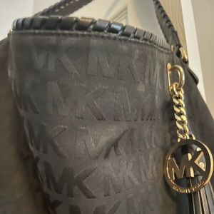 Black canvas MK with gold hardware